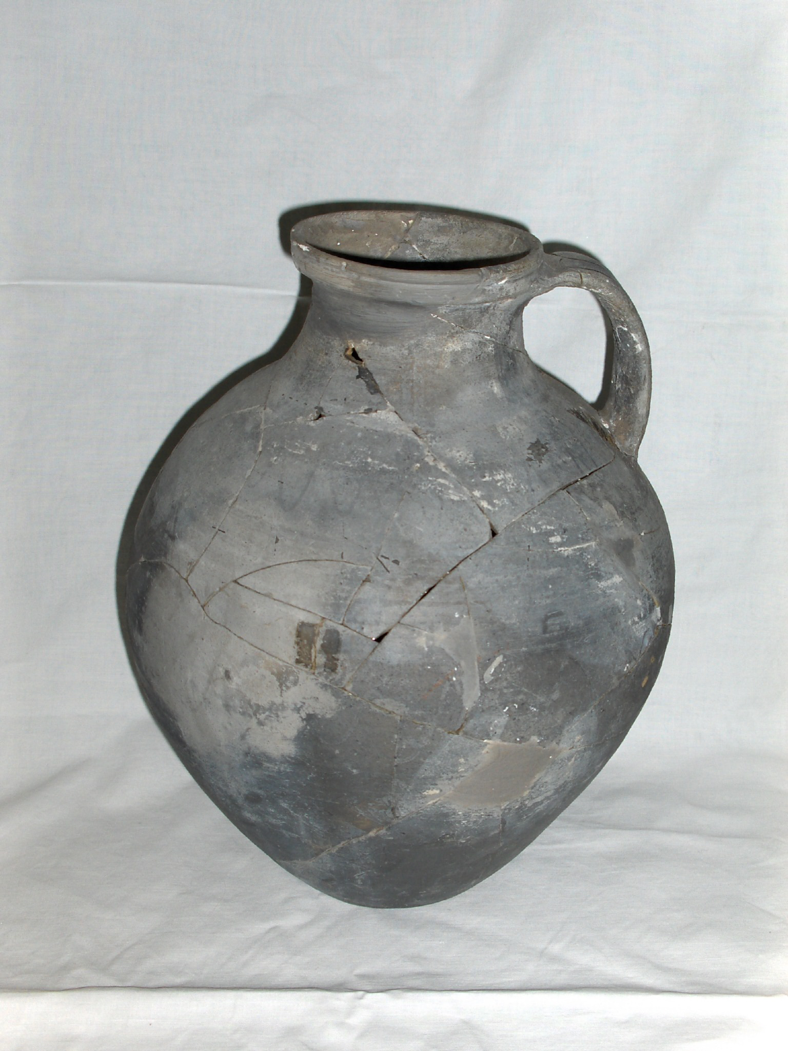 An Image Of A Complete Greyware Pot.